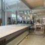 CNC-Maschine mit chaotischem Plattenlager in der Werkstatt von Kreativmöbel Stückler