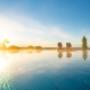 Infinitypool mit Blick in die sanfte Hügellandschaft des Südburgenlandes