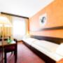 Economy Zimmer im Hotel Schrofenstein mit getrennten Betten