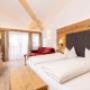 ein Schlafzimmer - Appartement Alpentraum