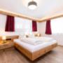 ein Schlafzimmer  - Appartement Alpentraum