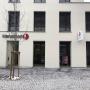 Hansaton Hörkompetenz-Zentrum Raiffeisenstraße 1a, Lustenau von der gegenüberliegenden Straßenseite kommend Hansaton Hörkompetenz-Zentrum Raiffeisenstraße 1a, Lustenau von der gegenüberliegenden Straßenseite kommend