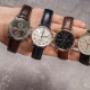 Vier IWC Portugieser Chronograph Uhren mit blauem, schwarzem und silbernem Zifferblatt, Automatikwerk, Chronographen-Funktion und Lederarmband – ikonische Luxusuhren mit klassischer Eleganz und höchster Präzision.