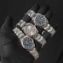 Luxuriöse Rolex Datejust Herrenarmbanduhren aus Edelstahl mit schwarzem, silbernem und blauem Zifferblatt, Automatikwerk, Oyster-Band und charakteristischer geriffelter Lünette – zeitlose Eleganz für stilbewusste Männer.