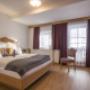 Schlafzimmer in der Ferienwohnung Glück - Appartements Schedererhaus Schlafzimmer in der Ferienwohnung Glück - Appartements Schedererhaus