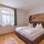 Schlafzimmer in der Ferienwohnung Glück - Appartements Schedererhaus Schlafzimmer in der Ferienwohnung Glück - Appartements Schedererhaus