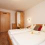 Schlafzimmer im Familien-Appartement bei Familie Steiner in Leogang im Salzburgerland