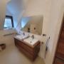 Lobis Haustechnik - Ihr Installateur - Badezimmer mit Waschbecken und Unterschrank