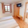Schlafzimmer der 2-Raum-Wohnung (Zimmer 15). Schlafzimmer der 2-Raum-Wohnung (Zimmer 15).