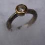 Ring
Mokume Gane Fassung in Feingold
Stein Brillant Ring
Mokume Gane Fassung in Feingold
Stein Brillant
