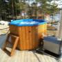 Badefass mit Kunststoffwanne, Sprudel und Außenofen 30 kW von SISU-SAUNA

www.sisu-sauna.at