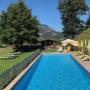 beheiztes Schwimmbad mit Sonnenliegen im Romantik Aparthotel Sonnleitn