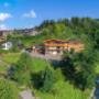 Panorama Romantik Aparthotel Sonnleitn in Hanglage am Fuße des Kitzbüuheler Horn