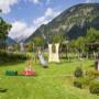 Spielplatz mit Klettergerüst, Rutsche und Wippe im Liebes Caroline ****Hotel Spielplatz mit Klettergerüst, Rutsche und Wippe im Liebes Caroline ****Hotel