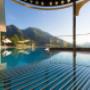 Infinity-Pool mit Ausblick auf die Berge Infinity-Pool mit Ausblick auf die Berge