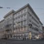 Außenansicht vom Café Bellaria in 1010 Wien: historisches Eckhaus mit Gründerzeit-Fassade, illuminiertem Logo und Schanigarten an der Bellariastraße – klassisches Wiener Kaffeehaus im Ringstraßenviertel.